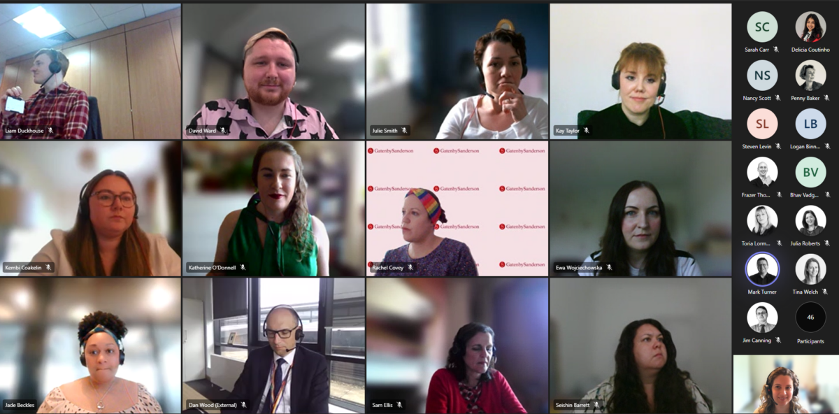Screenshot of Microsoft teams call with multiple smiling faces in a grid